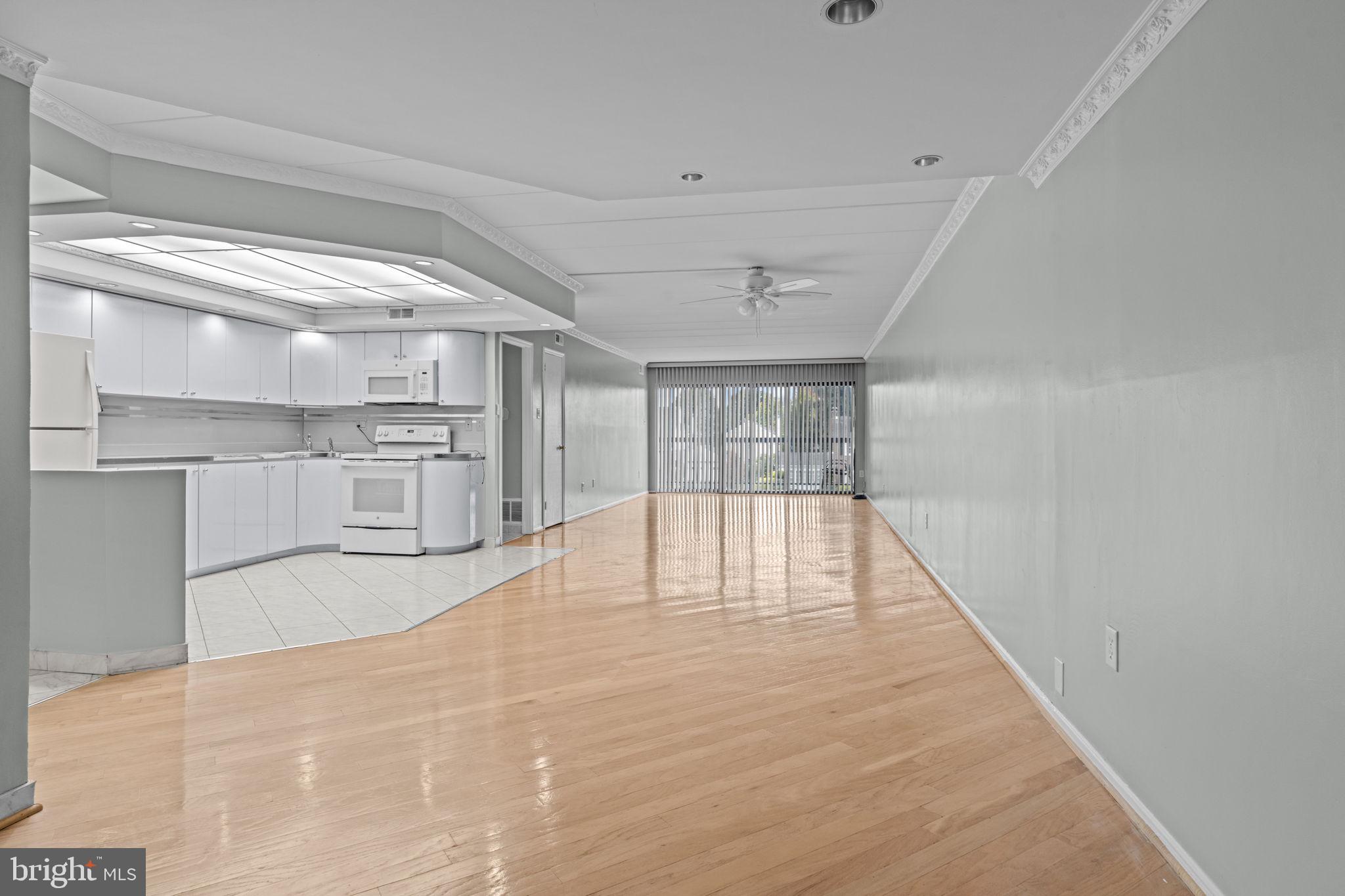 2131 Welsh Road, Unit 208 Philadelphia, PA 19115 - Photo 17 of 21 a view of empty room with wooden floor