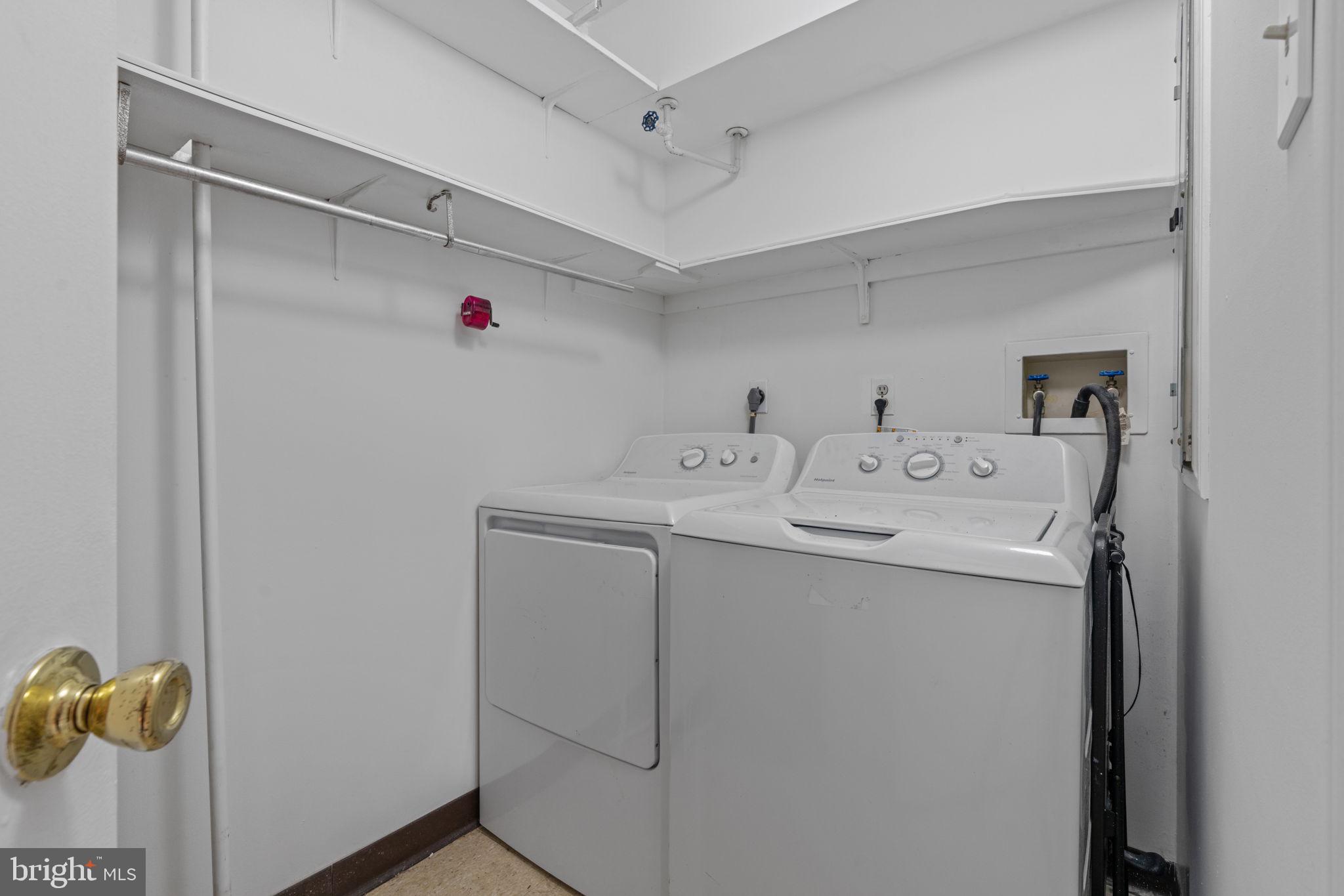 2131 Welsh Road, Unit 208 Philadelphia, PA 19115 - Photo 18 of 21 a utility room with dryer and washer