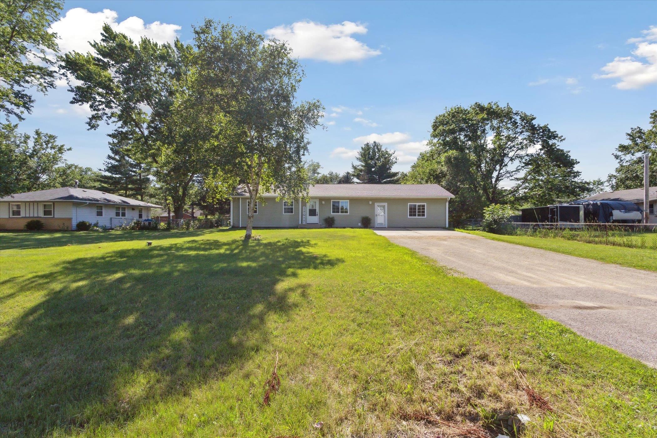 12570 Dorr Road Rockton, IL 61072 - Photo 3 of 43 a view of a house with a swimming pool