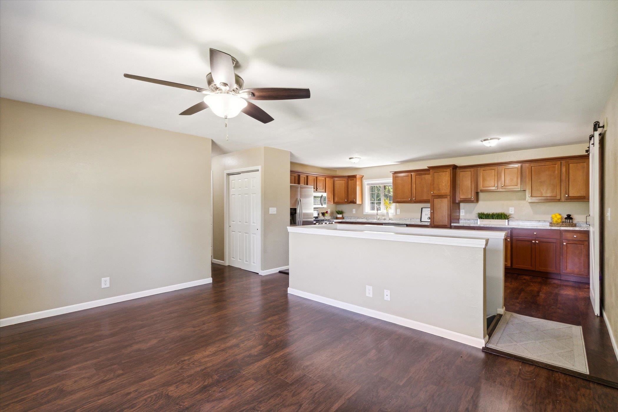 12570 Dorr Road Rockton, IL 61072 - Photo 10 of 43 a view of a kitchen with wooden floor