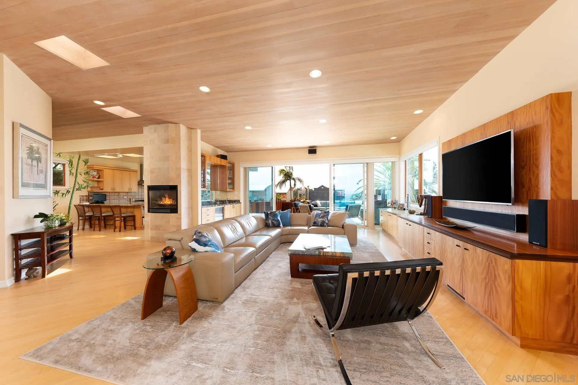 13748 Pine Needles Drive Del Mar, CA 92014 - Photo 11 of 49 a living room with furniture and a flat screen tv
