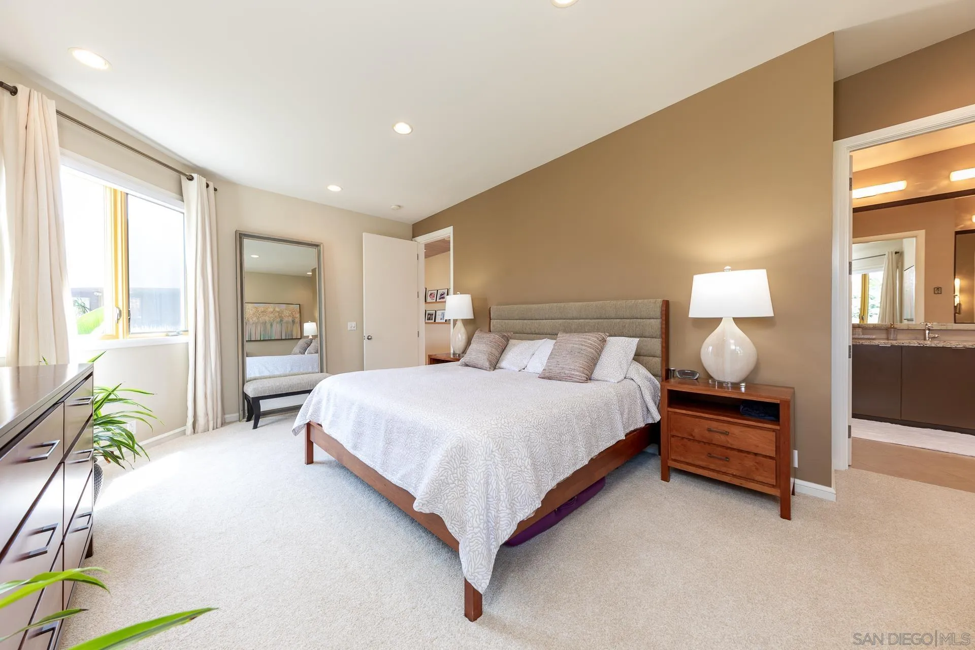 13748 Pine Needles Drive Del Mar, CA 92014 - Photo 17 of 49 a bedroom with a bed and lamps