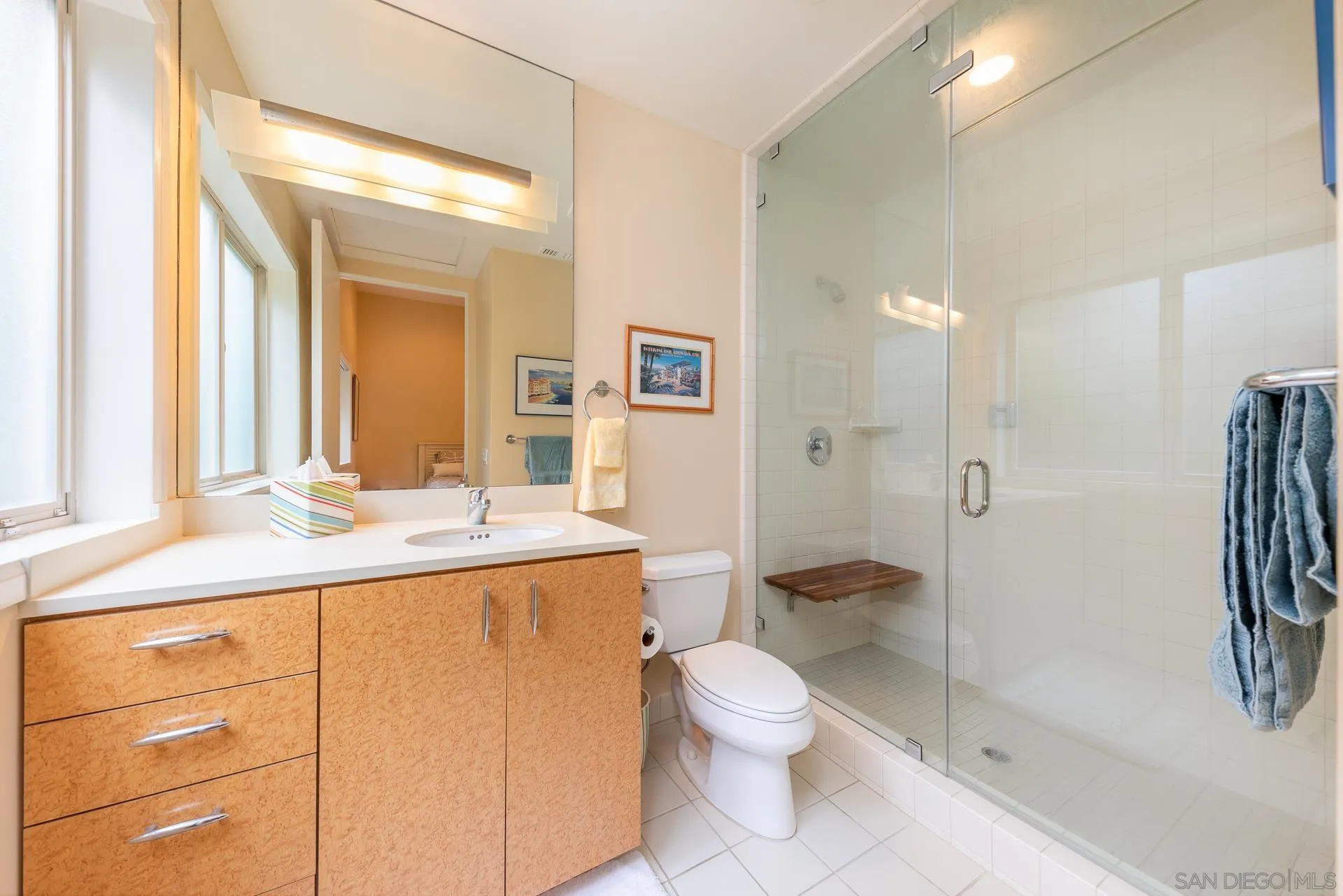 13748 Pine Needles Drive Del Mar, CA 92014 - Photo 24 of 49 a bathroom with a granite countertop sink toilet and shower