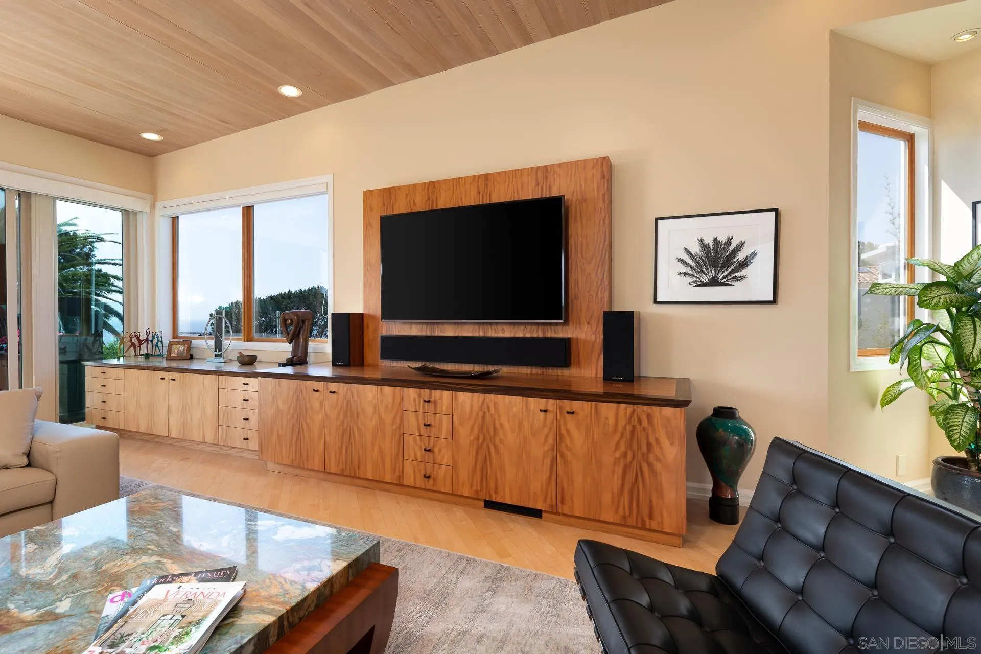 13748 Pine Needles Drive Del Mar, CA 92014 - Photo 34 of 49 a living room with furniture and a flat screen tv