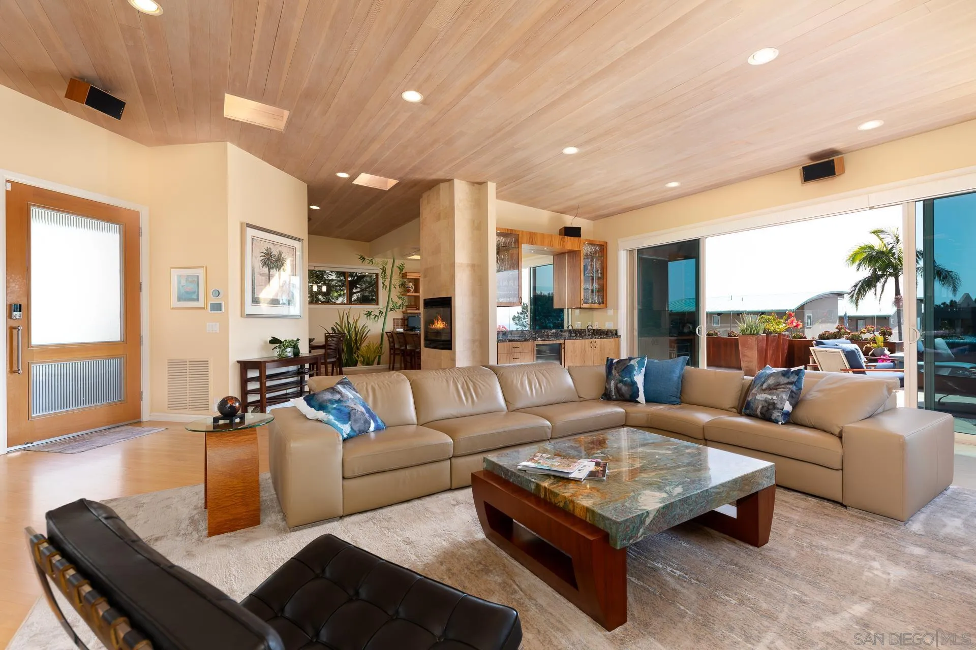 13748 Pine Needles Drive Del Mar, CA 92014 - Photo 36 of 49 a living room with furniture rug and a large window
