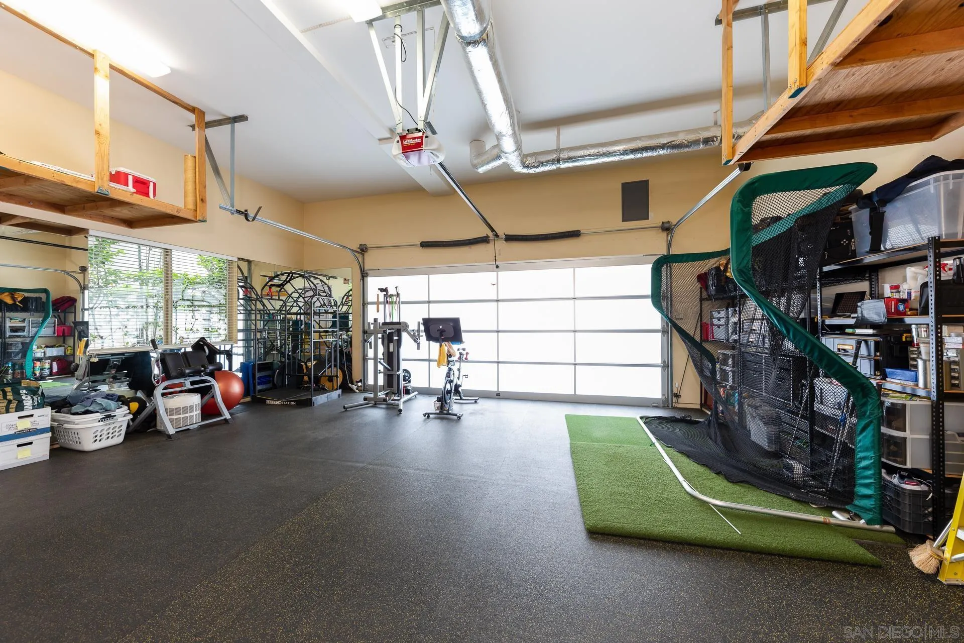 13748 Pine Needles Drive Del Mar, CA 92014 - Photo 37 of 49 a view of a room with gym equipment