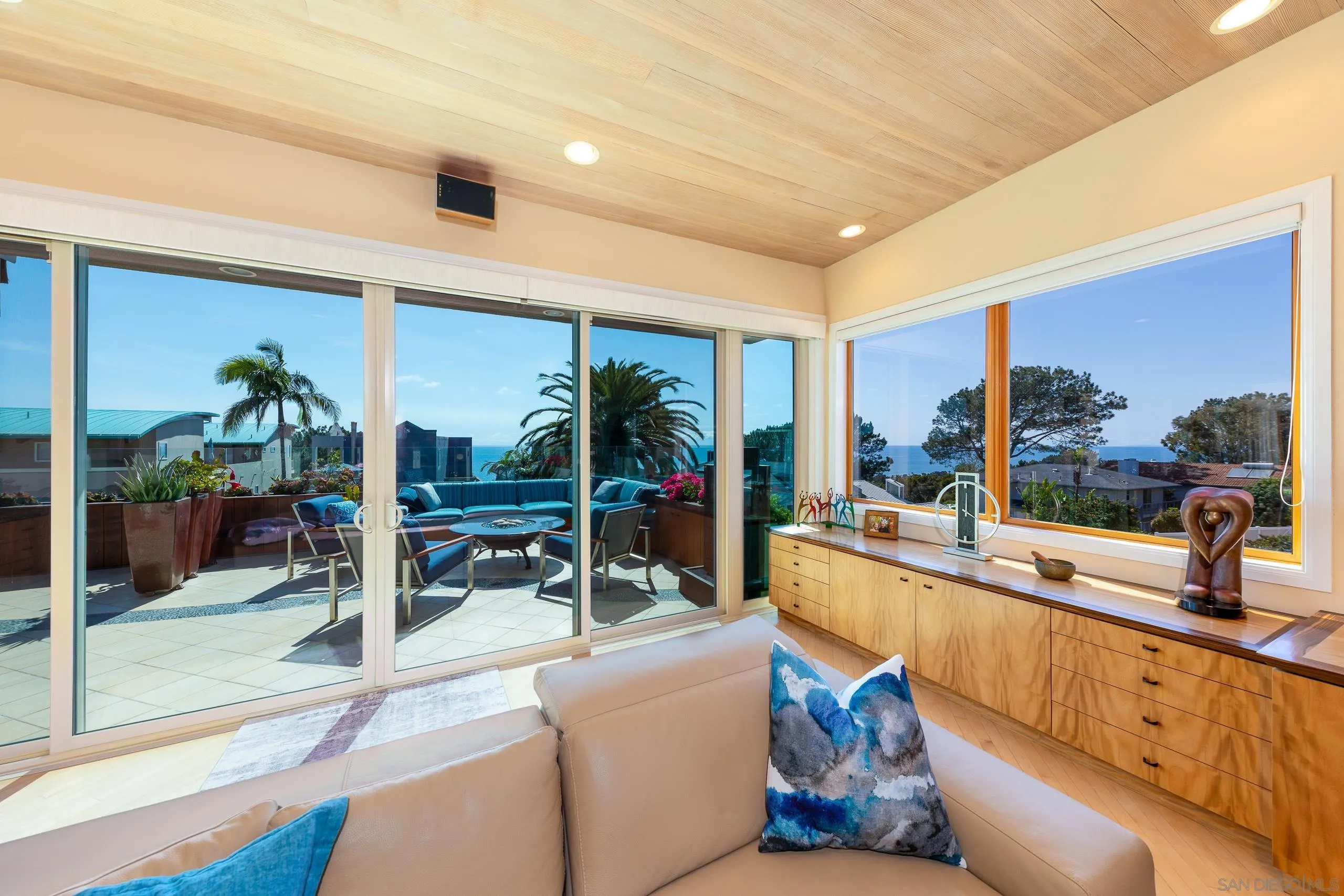 13748 Pine Needles Drive Del Mar, CA 92014 - Photo 41 of 49 a living room with large windows