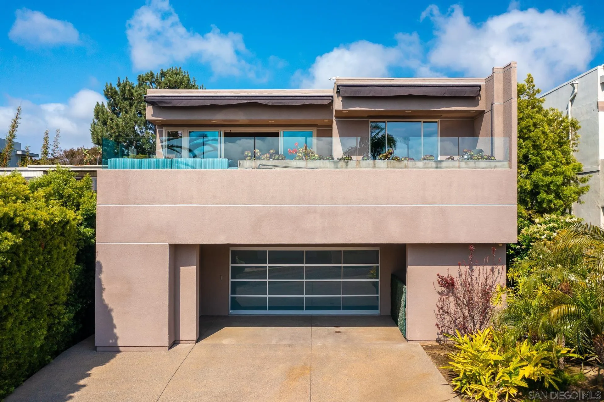 13748 Pine Needles Drive Del Mar, CA 92014 - Photo 43 of 49 a front view of a house with a yard
