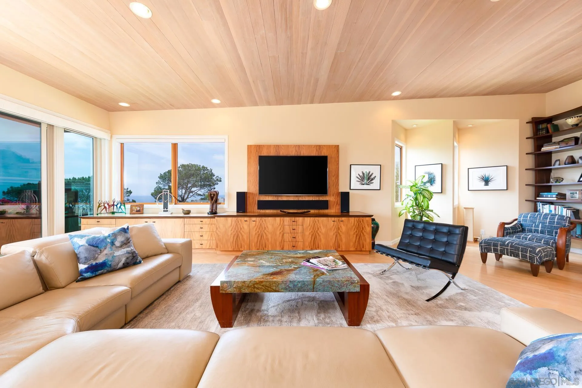 13748 Pine Needles Drive Del Mar, CA 92014 - Photo 5 of 49 a living room with furniture and a flat screen tv