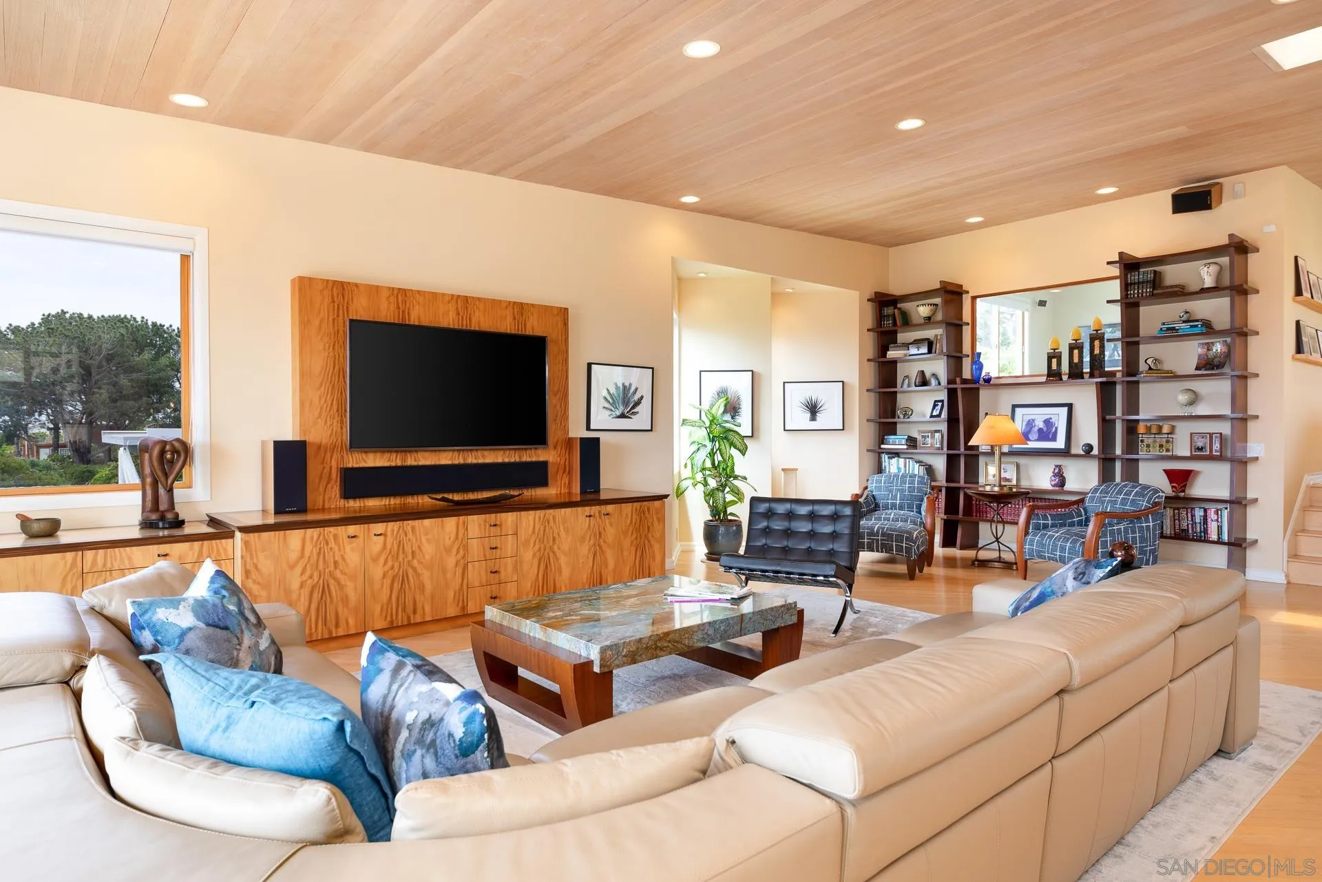 13748 Pine Needles Drive Del Mar, CA 92014 - Photo 6 of 49 a living room with furniture and a flat screen tv