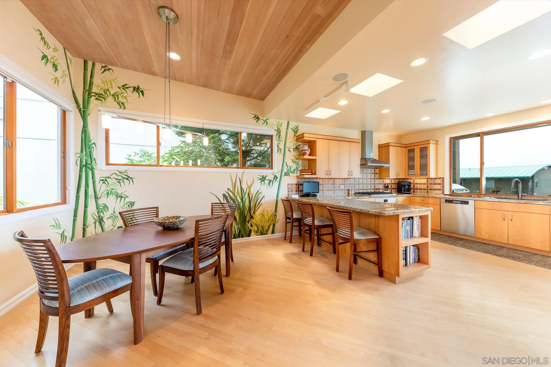 13748 Pine Needles Drive Del Mar, CA 92014 - Photo 9 of 49 a view of a dining room with furniture a chandelier and kitchen view