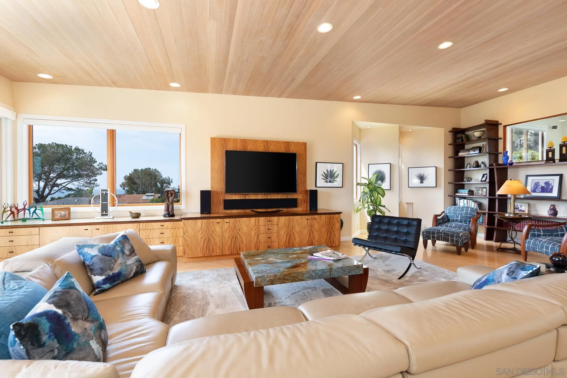 13748 Pine Needles Drive Del Mar, CA 92014 - Photo 10 of 49 a living room with furniture and a flat screen tv