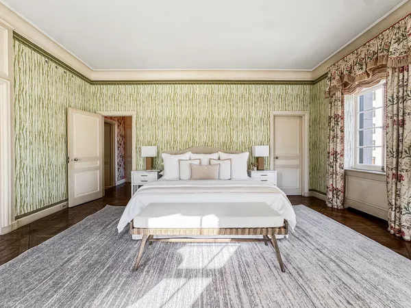 a bed room with a bed and a couch