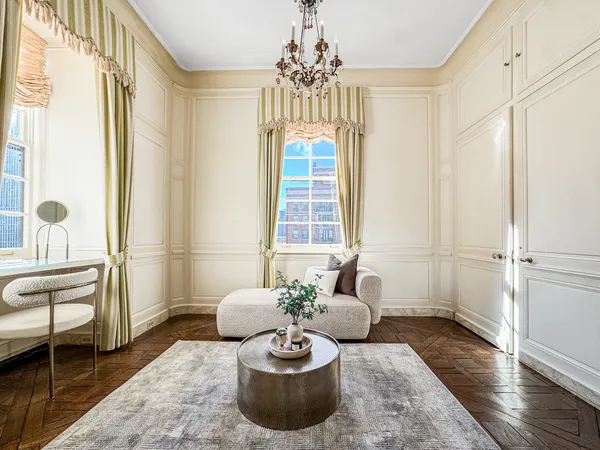 a living room with granite countertop furniture and a fireplace
