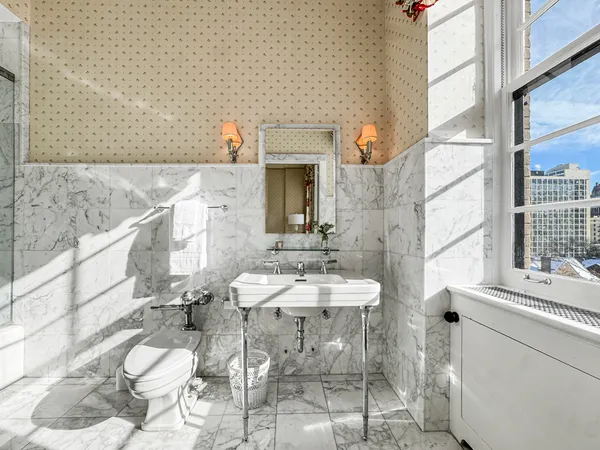 a view of a hallway with washer and dryer
