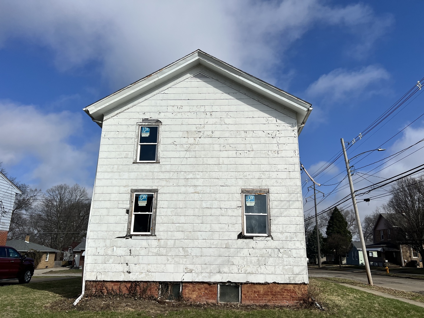 819 Bell Street Bloomington, IL 61701 - Photo 11 of 14 a front view of a house with a yard