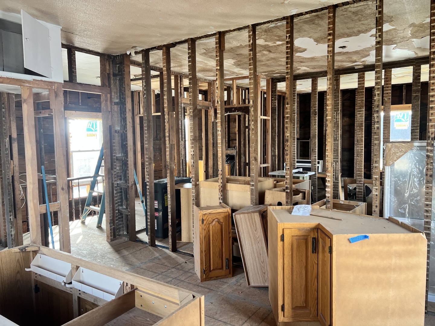 819 Bell Street Bloomington, IL 61701 - Photo 2 of 14 a living room with large windows and furniture