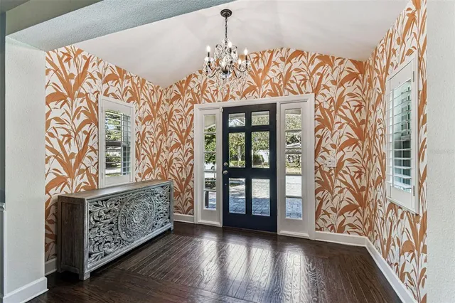 walk in closet with wooden floor