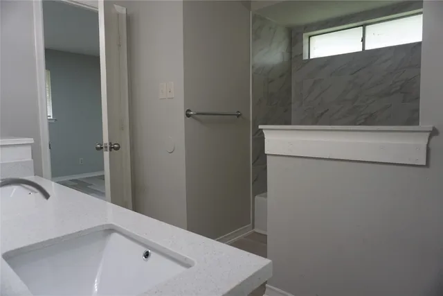 a bathroom with a sink and a tub