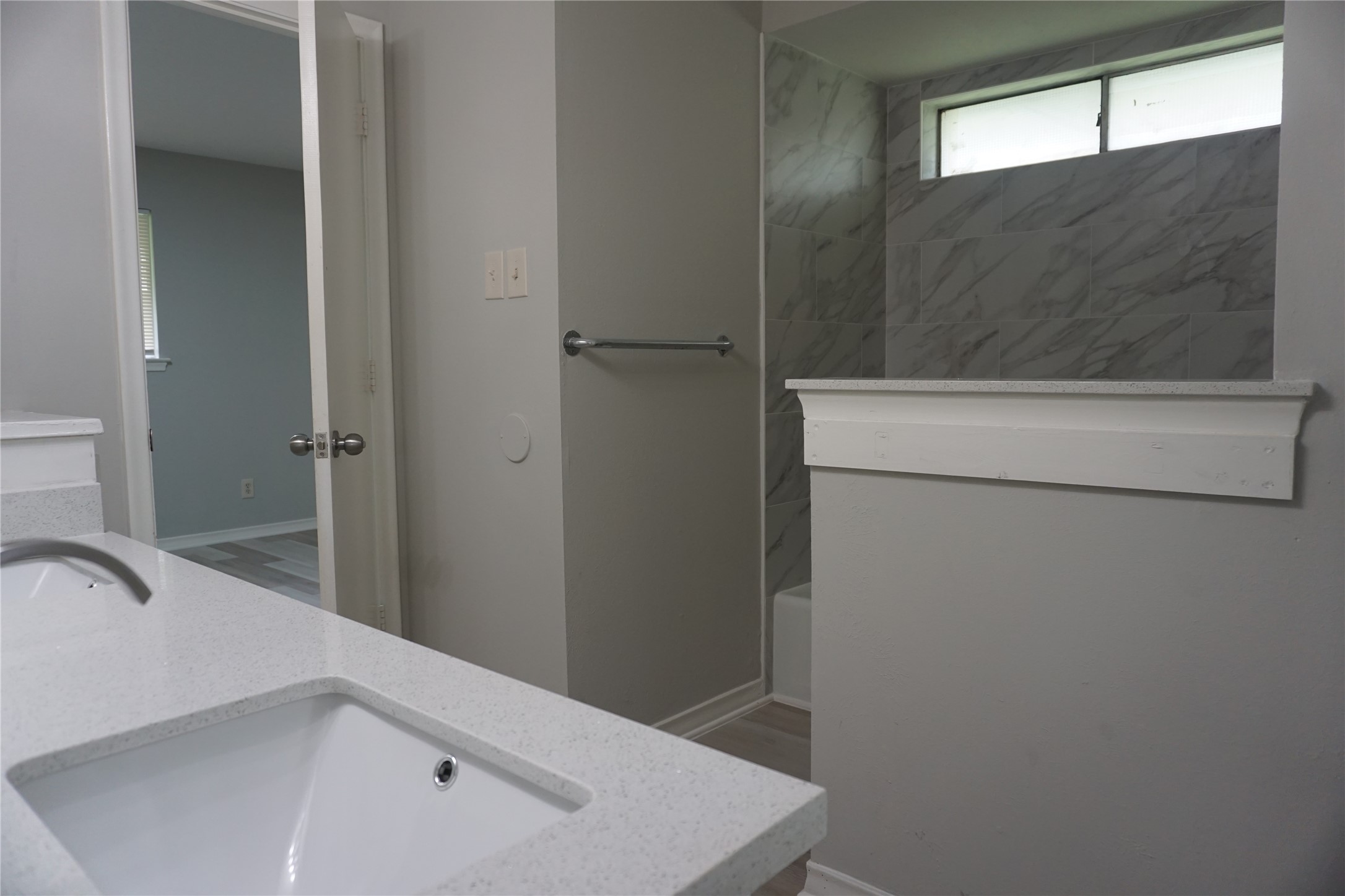 1913 Normal Park Drive, Unit B Huntsville, TX 77340 - Photo 20 of 29 a bathroom with a sink and a tub