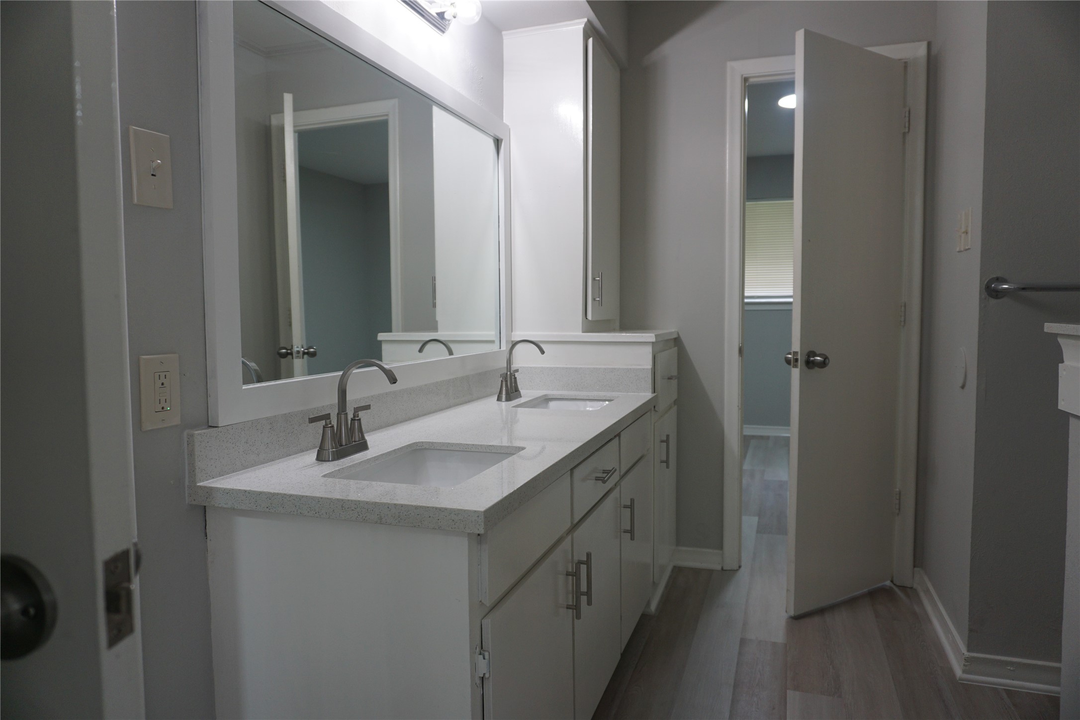1913 Normal Park Drive, Unit B Huntsville, TX 77340 - Photo 21 of 29 a bathroom with a sink and a mirror