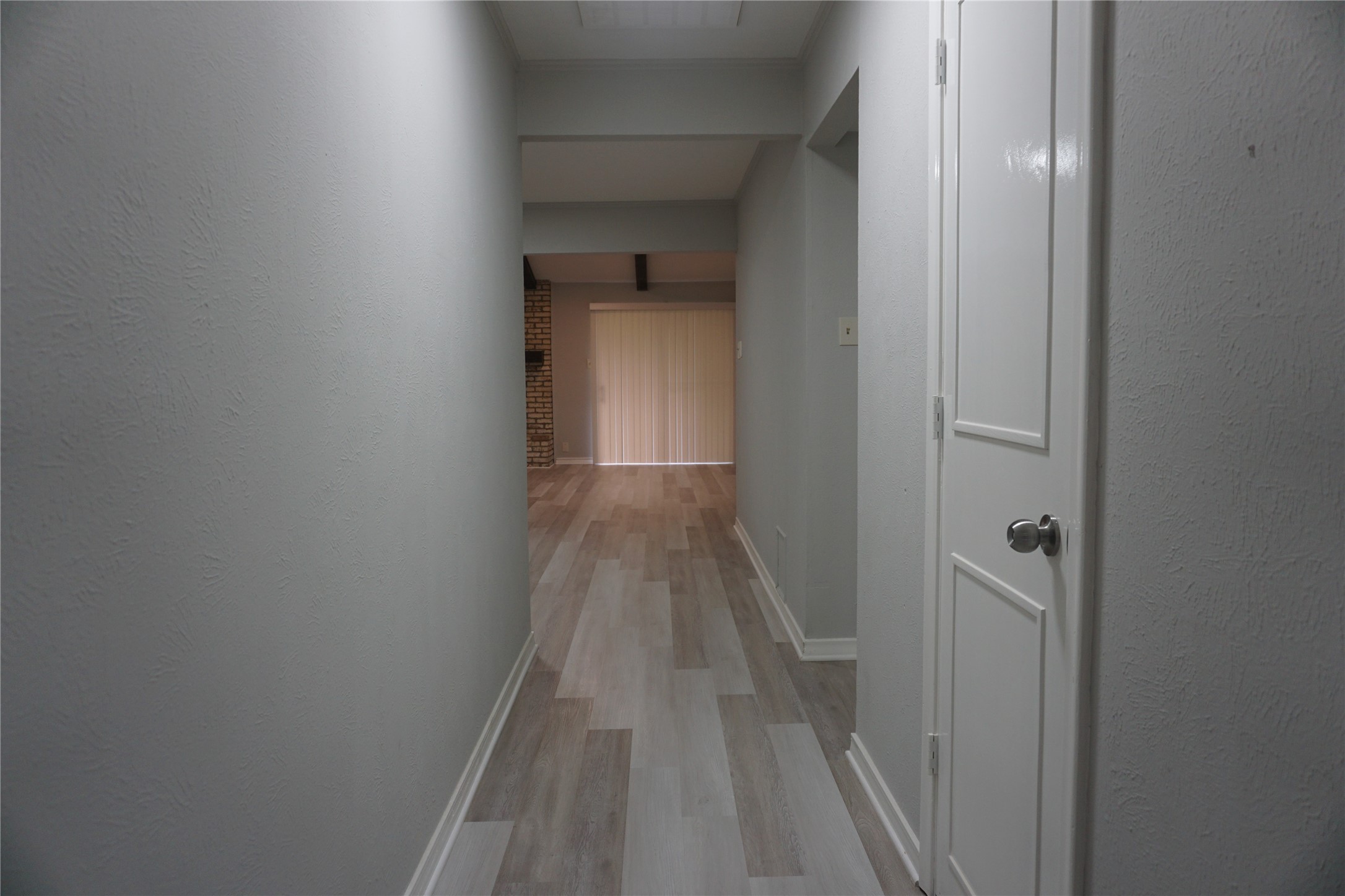 1913 Normal Park Drive, Unit B Huntsville, TX 77340 - Photo 5 of 29 a view of a bathroom from a hallway
