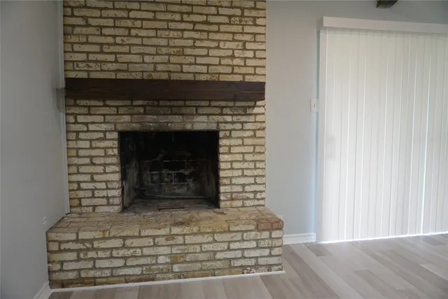 a living room with a fireplace