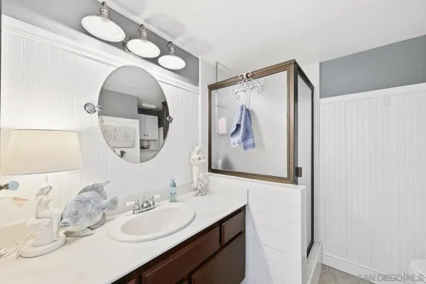 a bedroom with a large bed and a large window