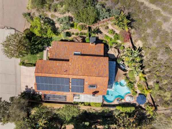 a buildings view with sitting space and garden space