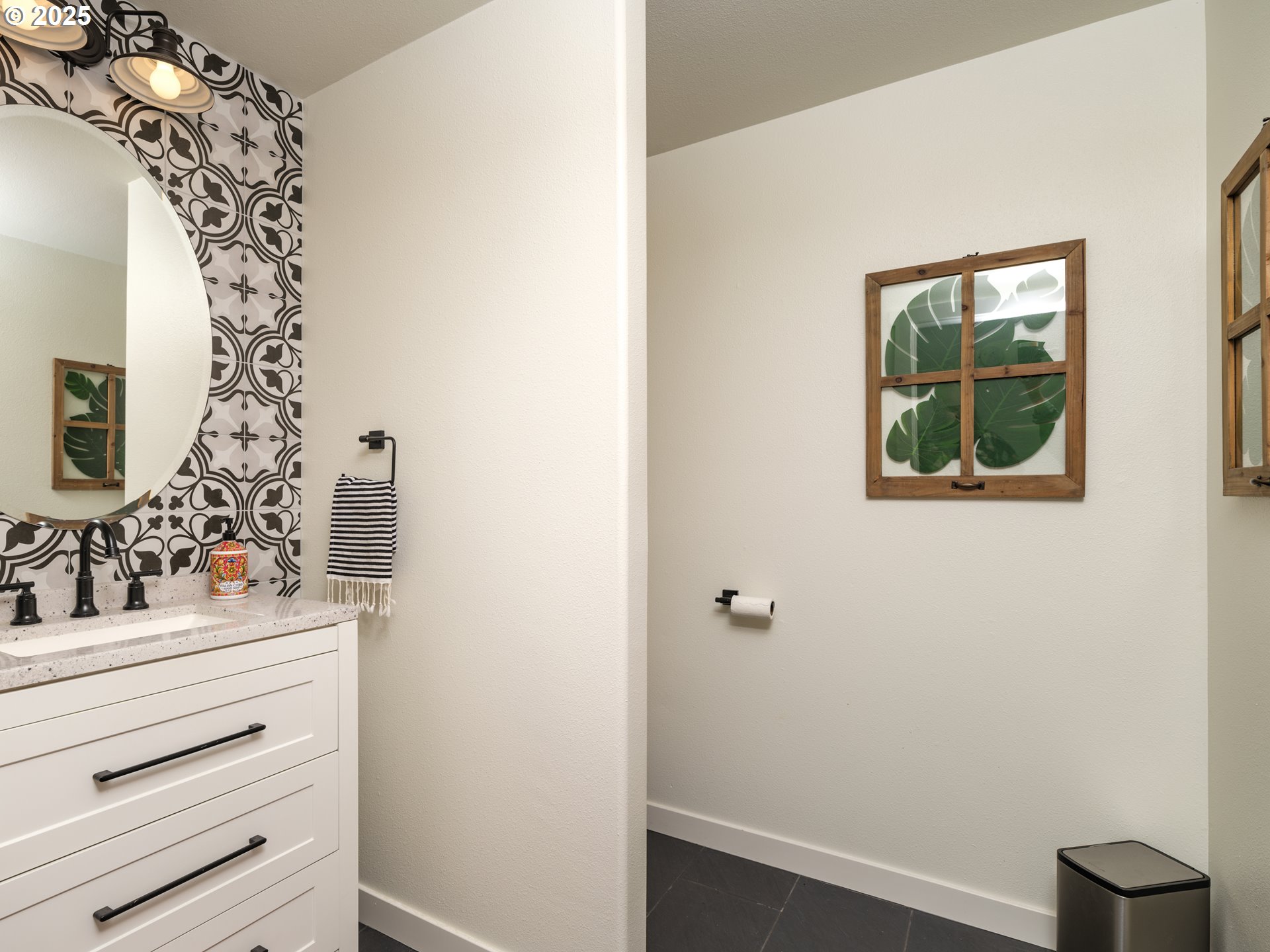 33340 Sunset Beach Road Warrenton, OR 97146 - Photo 20 of 48 a bathroom with a sink and a mirror