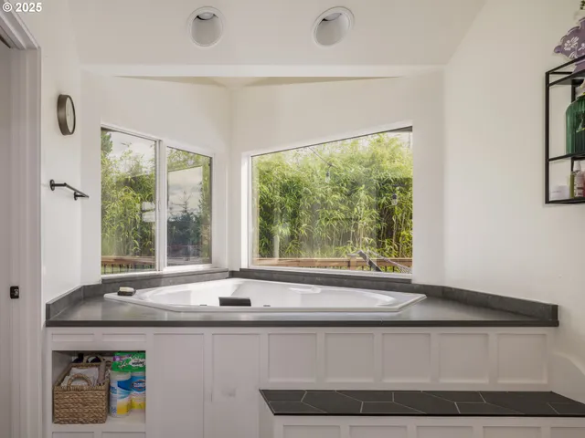 a view of a bath tub sitting in a room
