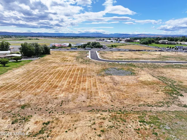 a view of an ocean and city