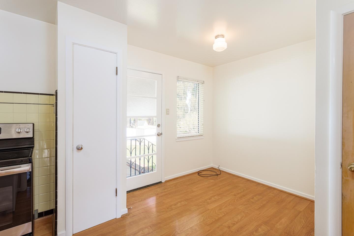 20 Fairview Place Millbrae, CA 94030 - Photo 12 of 21 a view of an empty room with a window