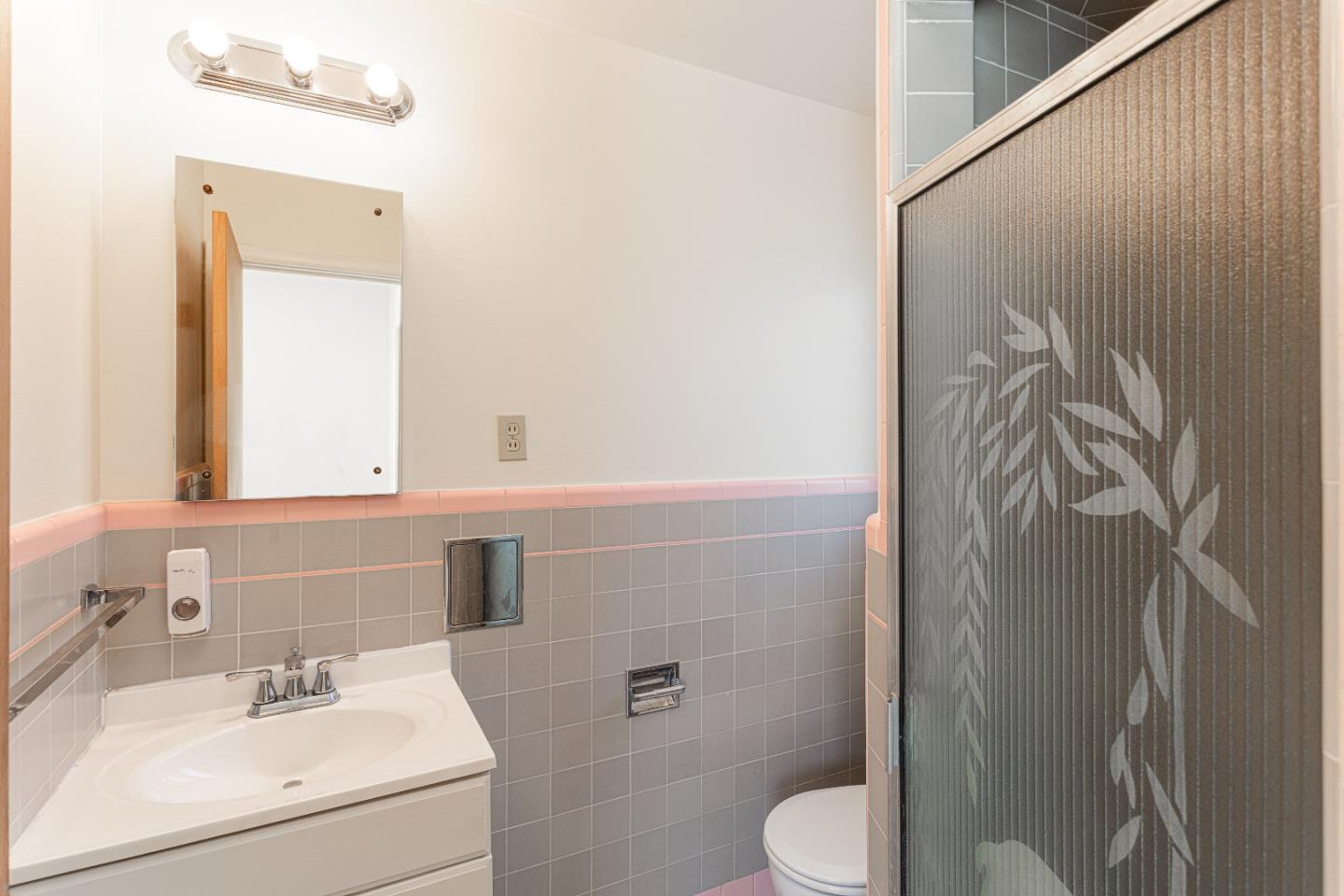 20 Fairview Place Millbrae, CA 94030 - Photo 14 of 21 a bathroom with a sink toilet and mirror