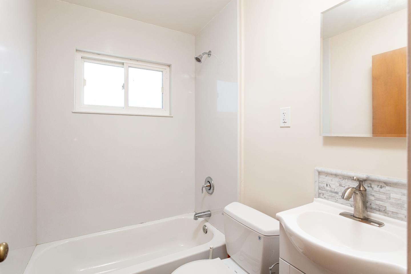 20 Fairview Place Millbrae, CA 94030 - Photo 17 of 21 a bathroom with a sink toilet and shower