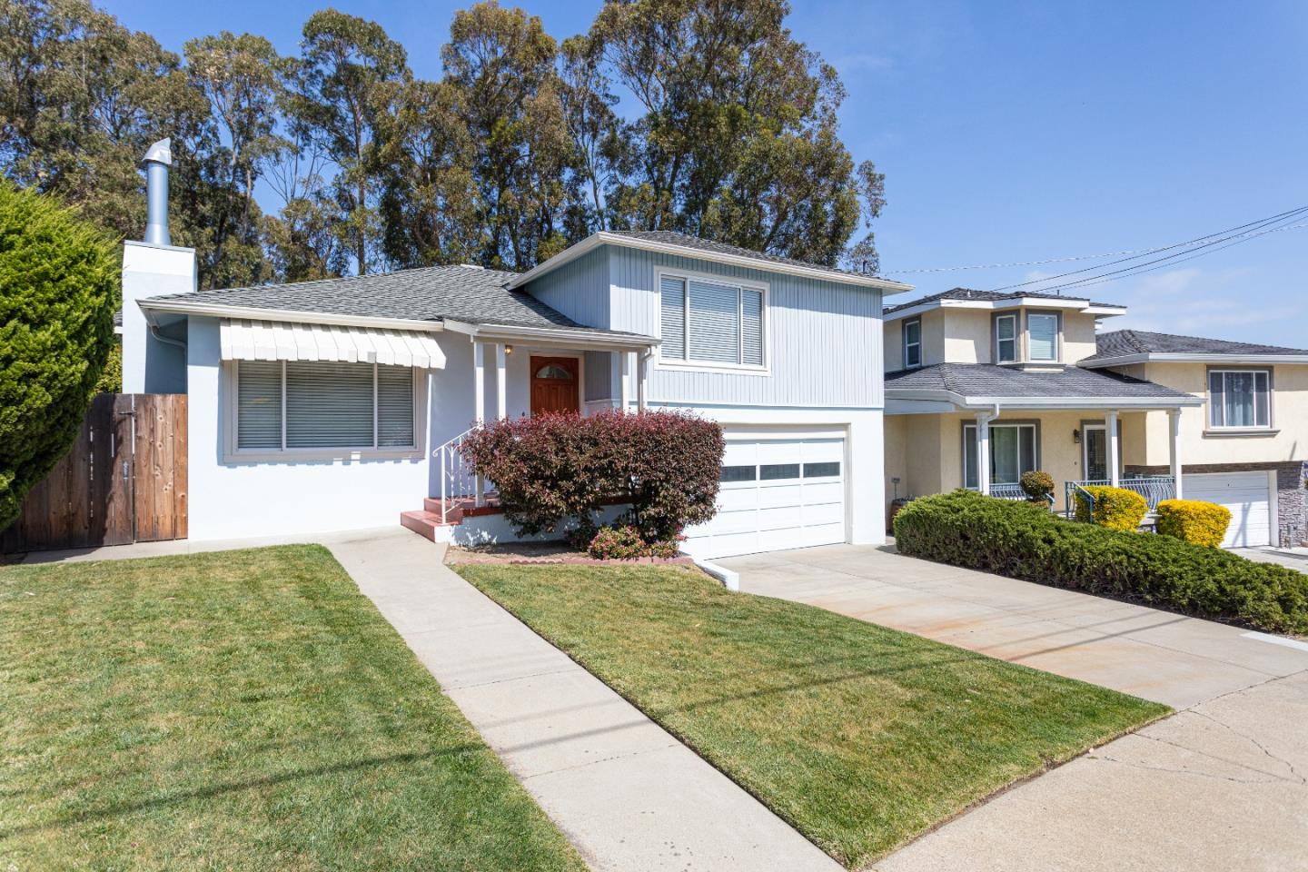 20 Fairview Place Millbrae, CA 94030 - Photo 2 of 21 a front view of a house with garden