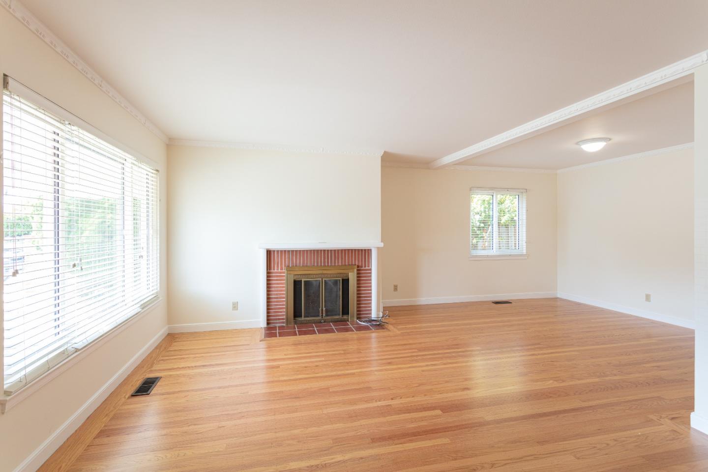 20 Fairview Place Millbrae, CA 94030 - Photo 5 of 21 a view of empty room with wooden floor and fan