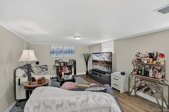 a bed room with two bed and a tv