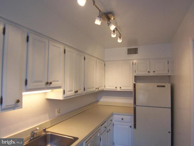 2220 Washington Avenue, Unit W302 Silver Spring, MD 20910 - Photo 6 of 12 Another kitchen perspective
