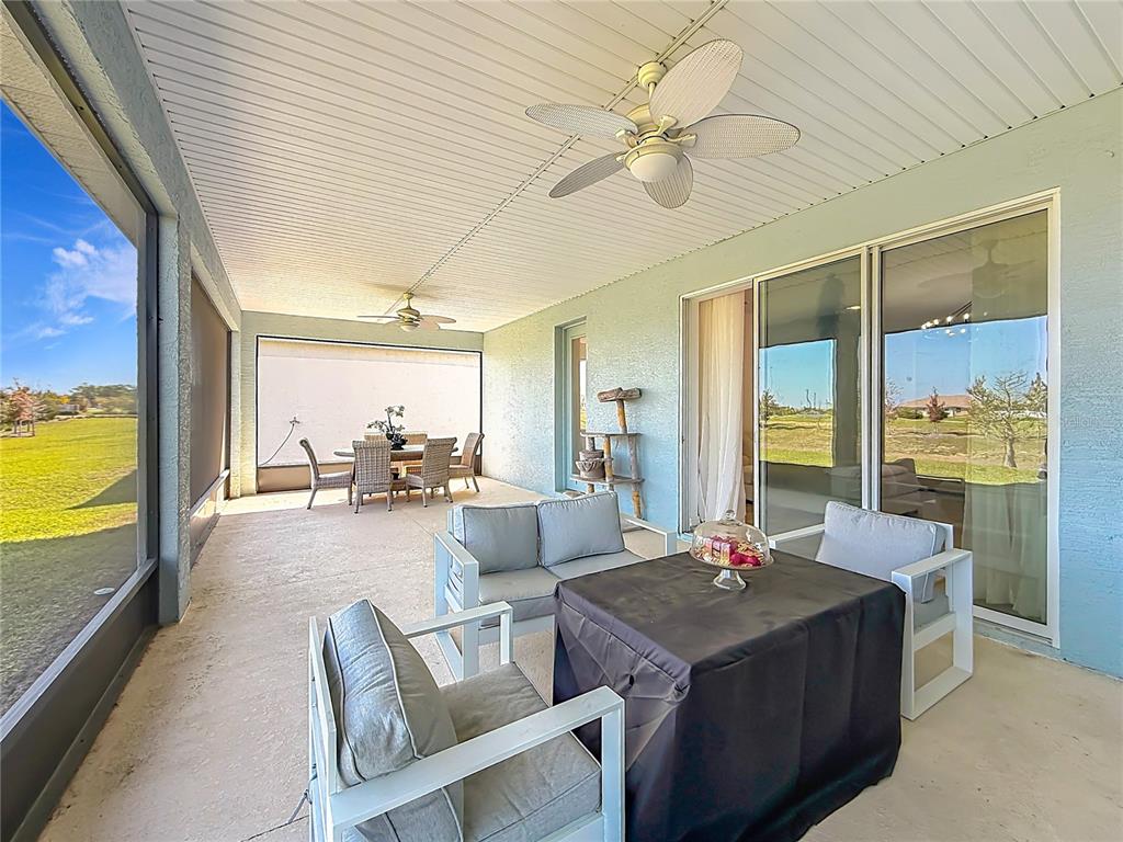 7429 Southwest 61st Street Ocala, FL 34474 - Photo 17 of 40 a living room with furniture and a large window