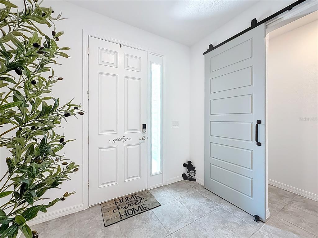 7429 Southwest 61st Street Ocala, FL 34474 - Photo 29 of 40 a view of an empty walk in closet