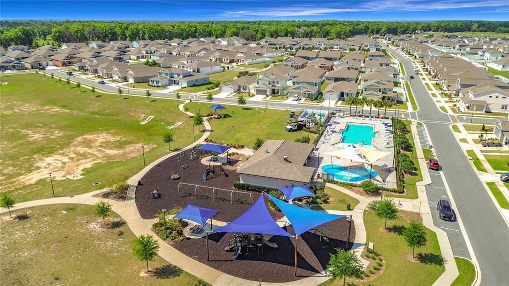 7429 Southwest 61st Street Ocala, FL 34474 - Photo 36 of 40 an aerial view of residential houses with outdoor space