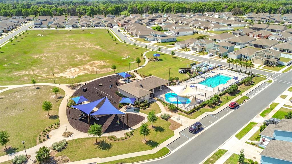 7429 Southwest 61st Street Ocala, FL 34474 - Photo 38 of 40 an aerial view of residential houses with outdoor space