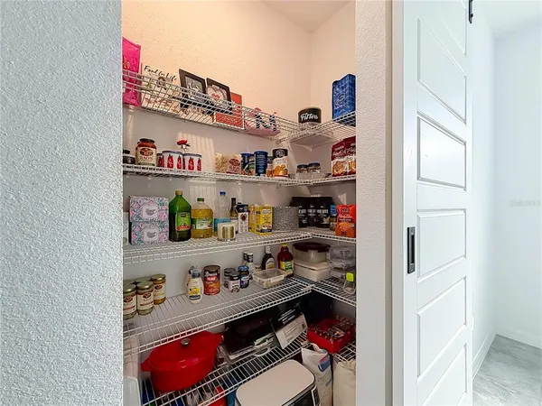 a room with storage and utility