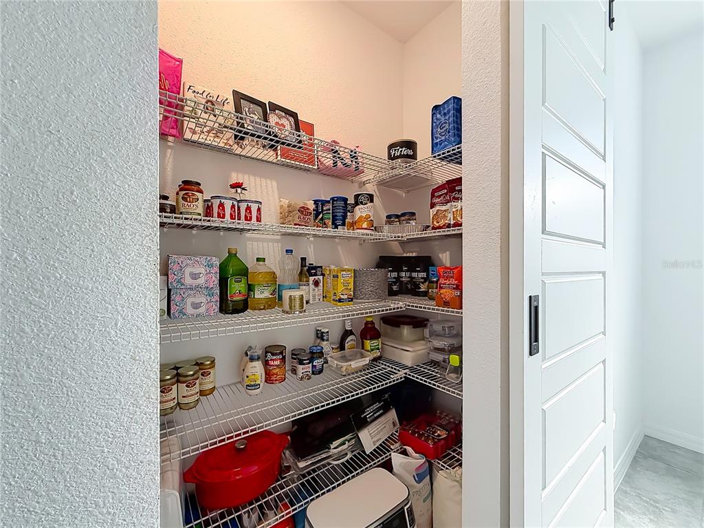 7429 Southwest 61st Street Ocala, FL 34474 - Photo 9 of 40 a room with storage and utility