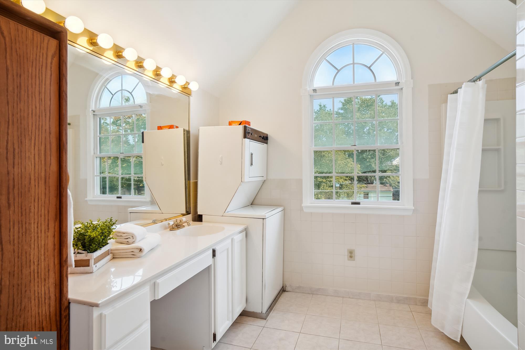 204 Maple Avenue Mount Airy, MD 21771 - Photo 35 of 44 Upper level hall bathroom with washer and dryer
