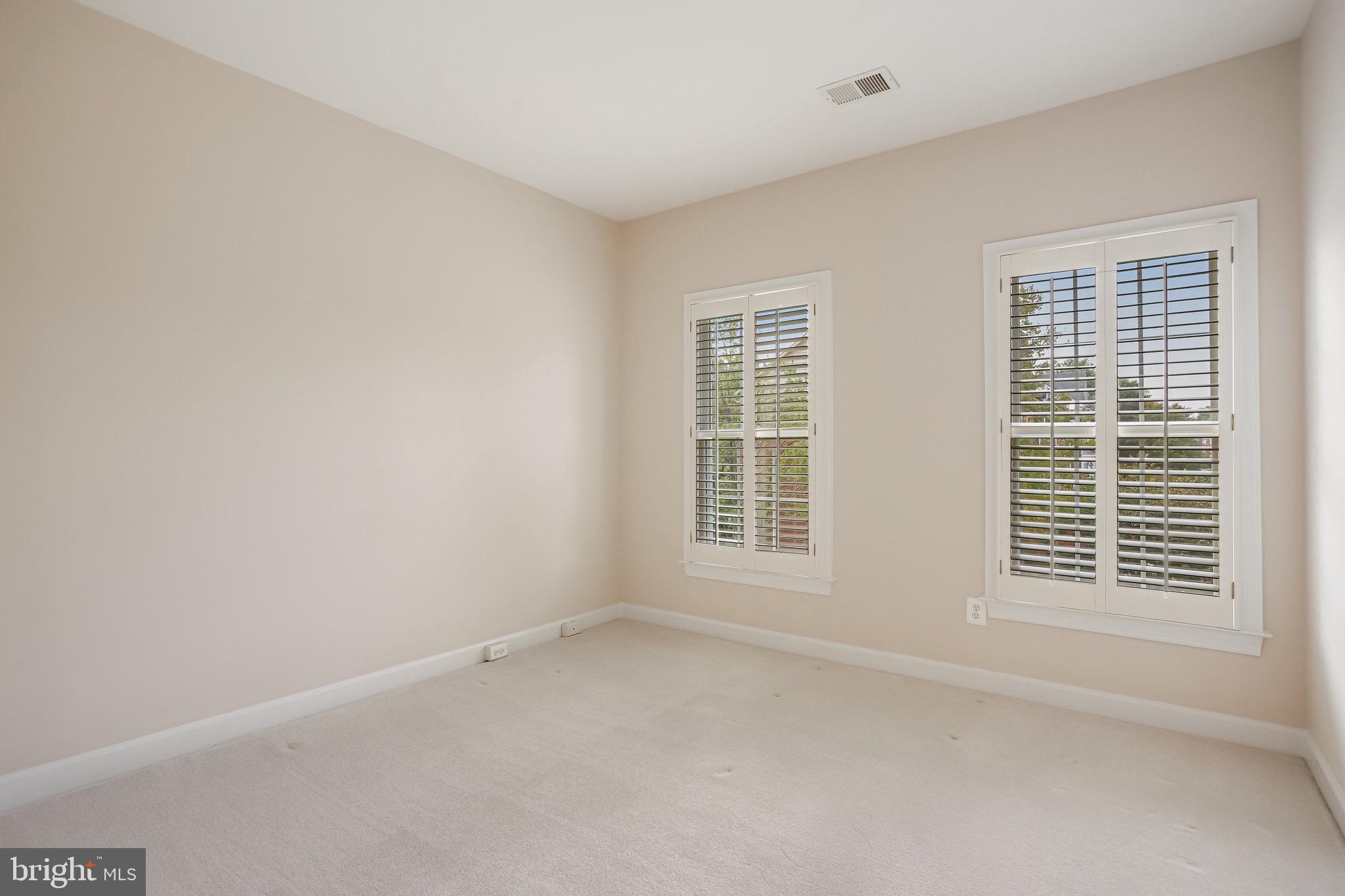 18546 Perdido Bay Terrace Leesburg, VA 20176 - Photo 28 of 57 an empty room with a window