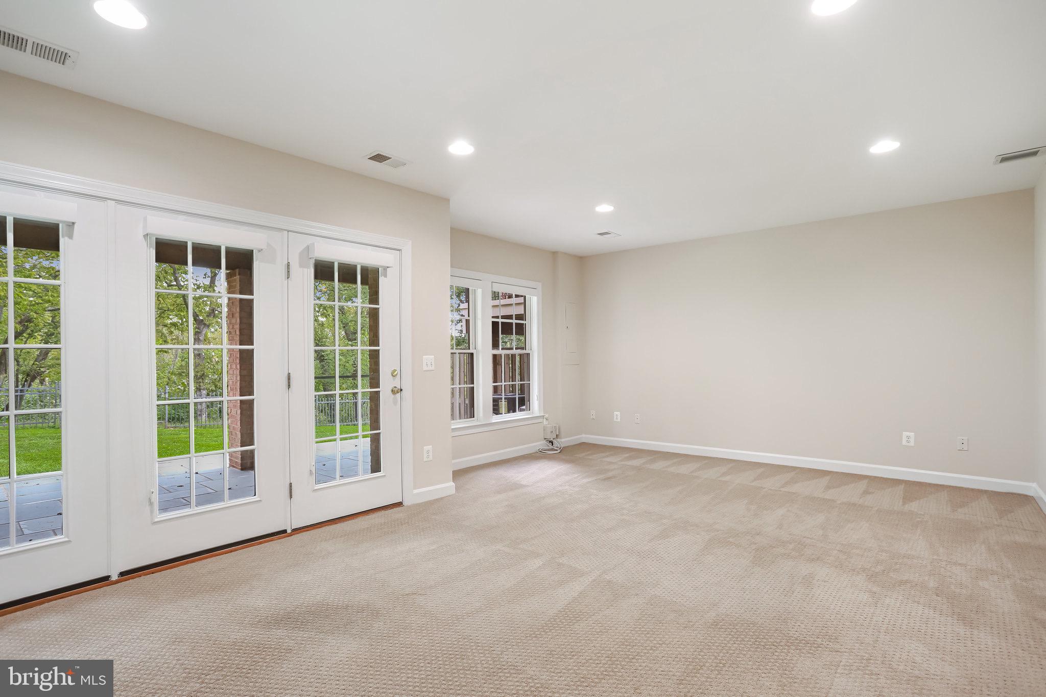 18546 Perdido Bay Terrace Leesburg, VA 20176 - Photo 32 of 57 a view of an empty room with a window and balcony