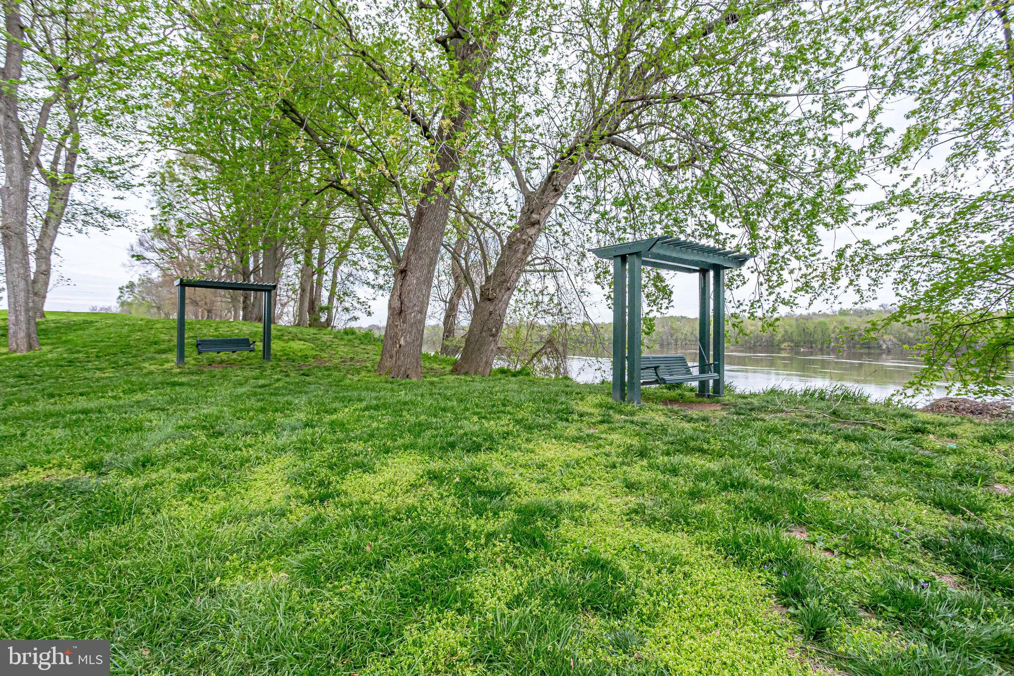 18546 Perdido Bay Terrace Leesburg, VA 20176 - Photo 48 of 57 a house view with a garden space