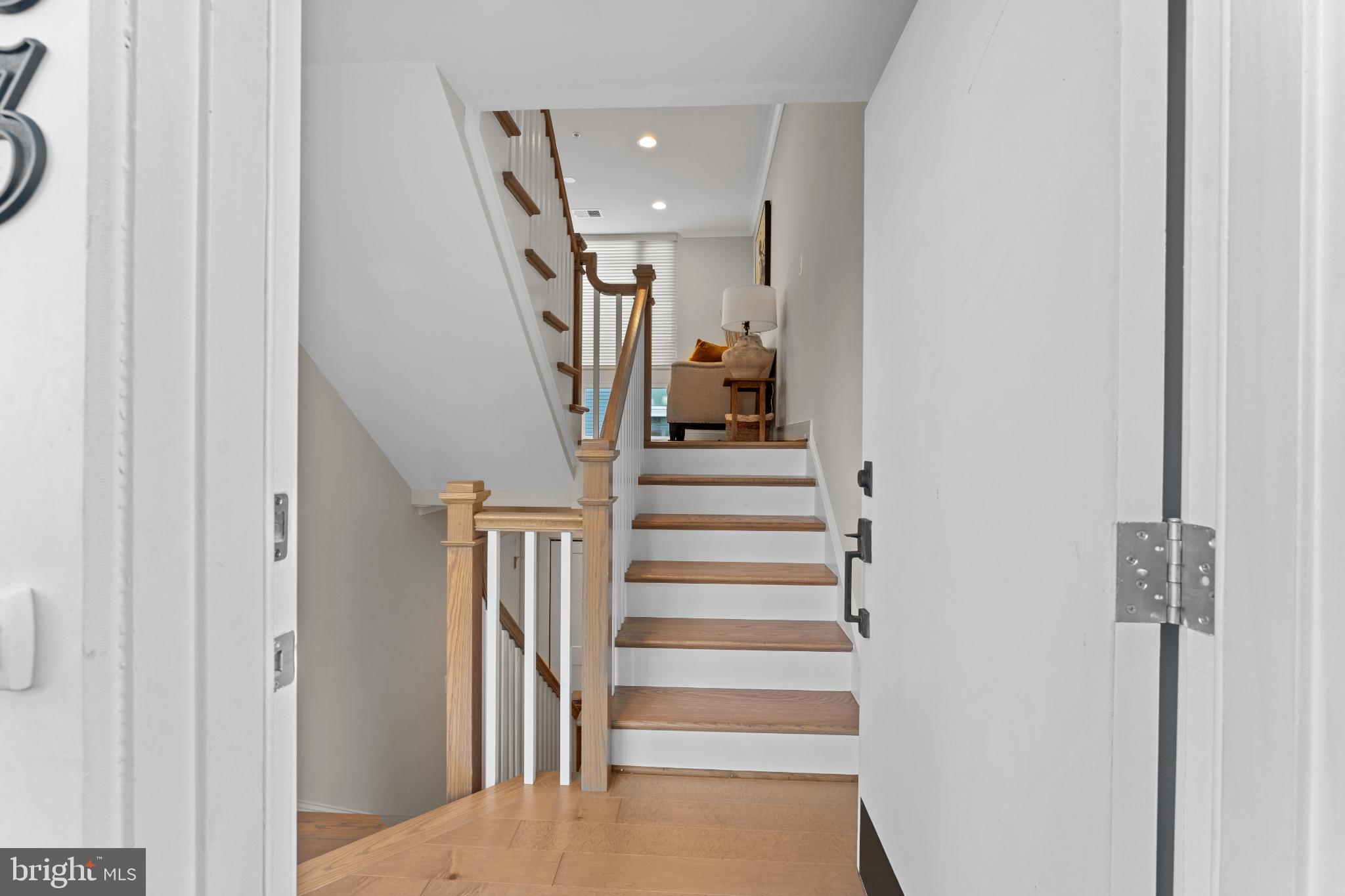 2823 24th Road South Arlington, VA 22206 - Photo 4 of 51 Inviting entryway with elegant staircase.